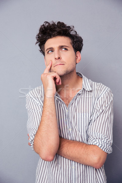 [[stock_photo]]: Portrait · jeunes · pensive · homme · gris