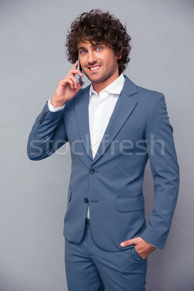 Geschäftsmann sprechen Telefon Porträt glücklich grau Stock foto © deandrobot