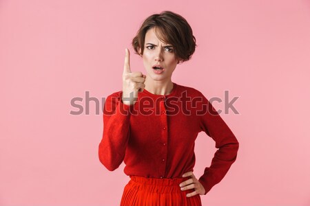Gyönyörű nő kockás póló áll megérint arc Stock fotó © deandrobot