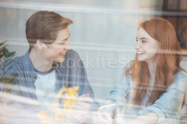 Csinos pár ül kávézó portré vicces Stock fotó © deandrobot