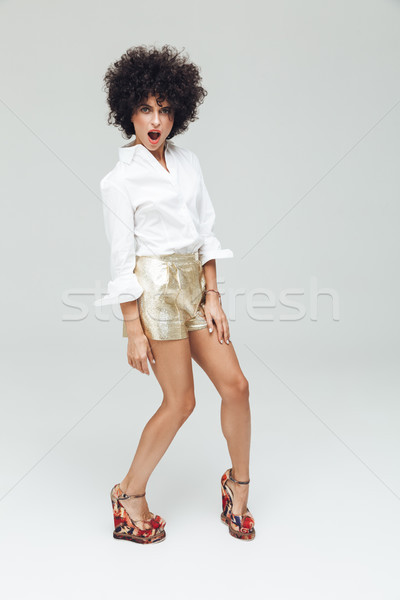 Emotional retro lady dressed in shirt Stock photo © deandrobot