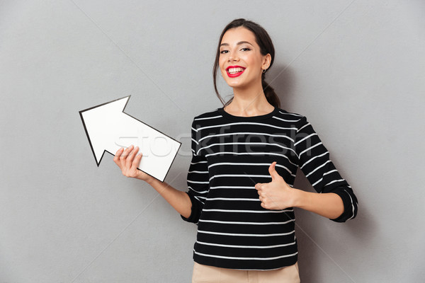 Stockfoto: Portret · tevreden · vrouw · wijzend · weg · pijl