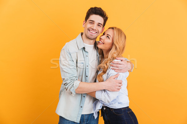 Portrait of young lovely people man and woman in basic clothing  Stock photo © deandrobot