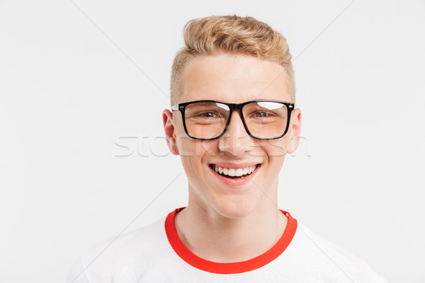 Image closeup of blond teenage guy having clean healthy skin wea Stock photo © deandrobot