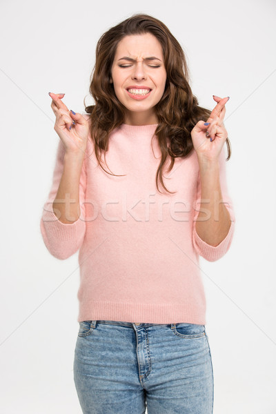 Vrouw permanente vingers jonge mooie vrouw geïsoleerd Stockfoto © deandrobot