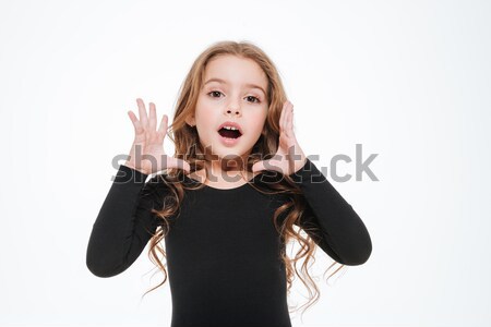 Cute curly little girl standing and calling for somebody Stock photo © deandrobot