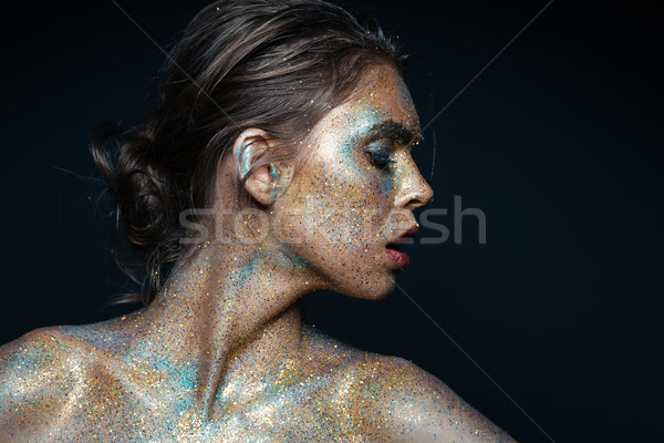 Beauty portrait of gorgeous young woman with shining fashion makeup Stock photo © deandrobot