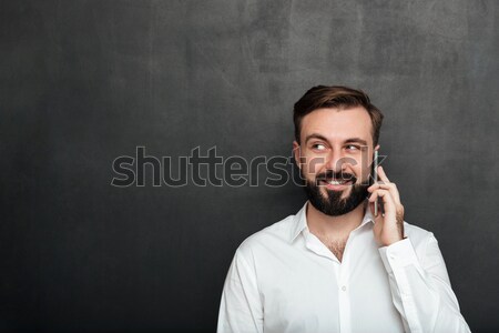 吸引力 男子 說 智能手機 愉快 談話 商業照片 © deandrobot