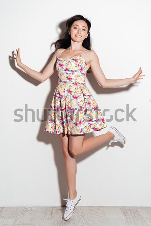 Full length portrait of a happy little girl Stock photo © deandrobot