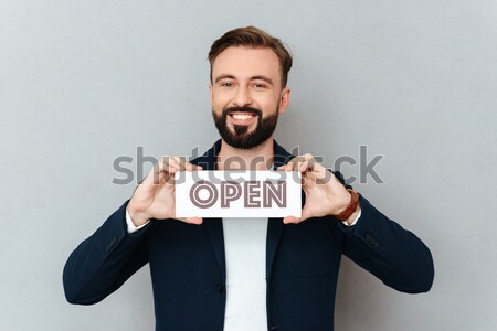 Stock photo: Young man celebrating his success