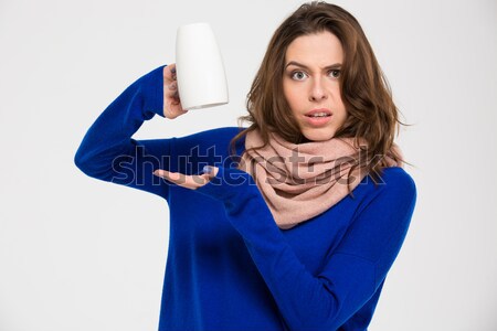 Attractive gentle young woman touching and enjoying soft pink scarf  Stock photo © deandrobot