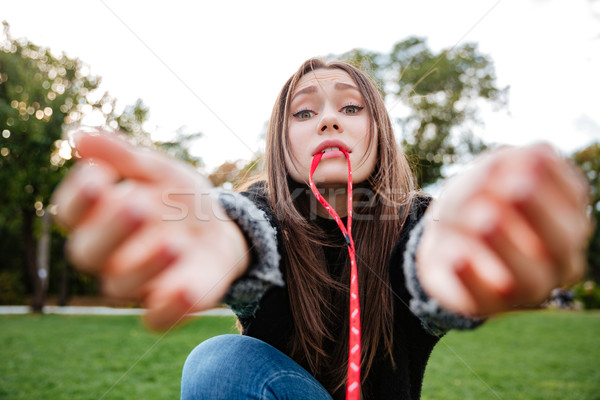 Szórakoztató nő tart póráz kutya száj Stock fotó © deandrobot