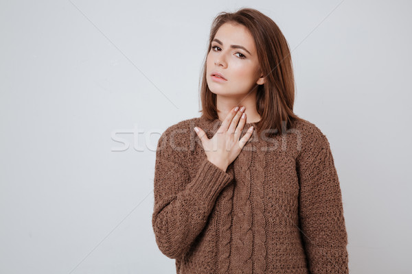 ストックフォト: 病気 · 若い女性 · 触れる · 首 · 画像 · セーター