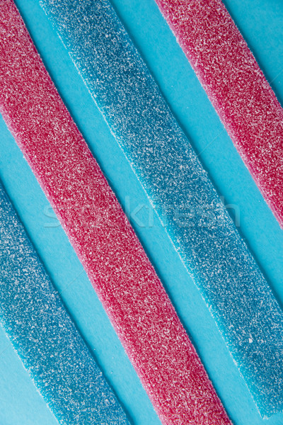 Sweet blue and pink gummy sticks with different flavor Stock photo © deandrobot