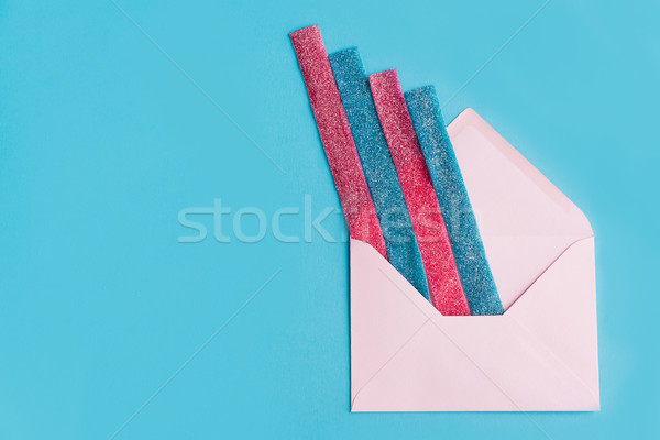 Sweet gummy sticks with blueberry and raspberry flavor Stock photo © deandrobot