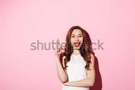 Kép ravasz rejtély nő másfelé néz rózsaszín Stock fotó © deandrobot