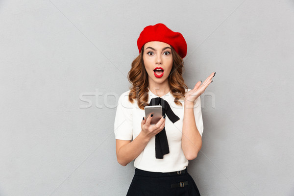 Foto stock: Retrato · animado · aluna · uniforme · telefone · móvel