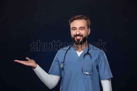 Retrato feliz doctor de sexo masculino uniforme estetoscopio Foto stock © deandrobot