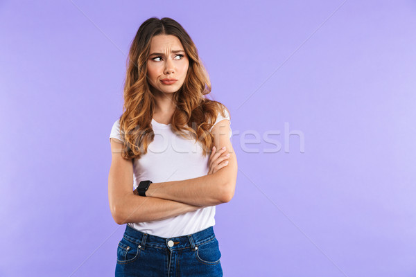 Porträt verärgert junge Mädchen stehen isoliert violett Stock foto © deandrobot