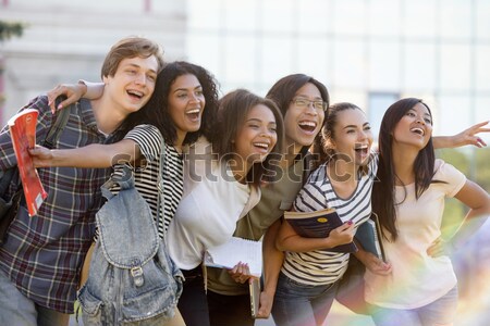 Stock photo: Happy business group giving thumbs up