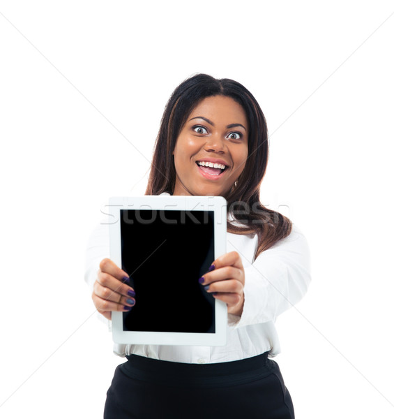 Cheerful businesswoman showing tablet computer screen Stock photo © deandrobot