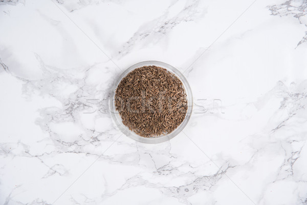 Top view of a natural oat grains in bowl Stock photo © deandrobot
