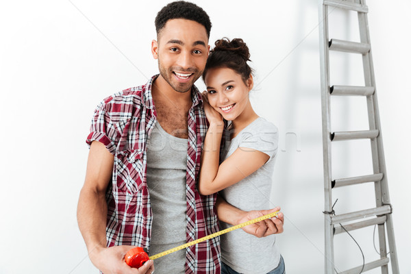 Cute couple during repair Stock photo © deandrobot