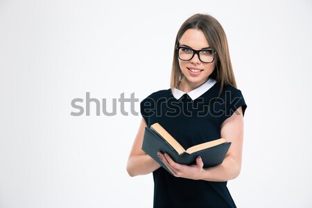 Smiling blonde business woman in eyeglasses pointing away Stock photo © deandrobot