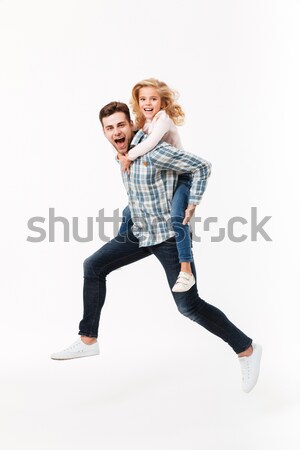 Full length portrait of a cheery father Stock photo © deandrobot
