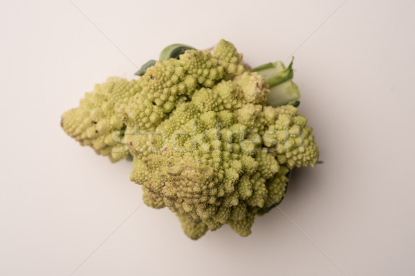 Close up of a ripe cauliflower isolated over white Stock photo © deandrobot