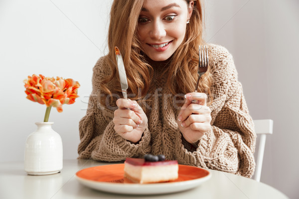 ストックフォト: 画像 · 飢えた · 女性 · 座って · 表 · 食べ