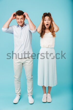 Shocked caucasian people man and woman Stock photo © deandrobot