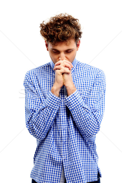 Handsome Man With Curly Hair Praing Over White Background Stock