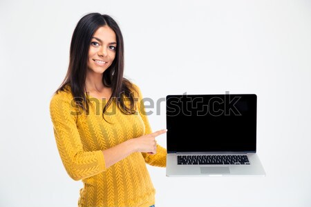 Mujer senalando dedo ordenador portátil Screen feliz Foto stock © deandrobot