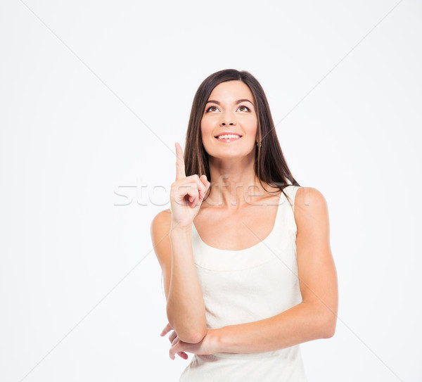 Boldog figyelmes nő mutat ujj felfelé Stock fotó © deandrobot