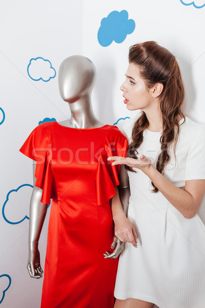 Woman talking with manikin Stock photo © deandrobot