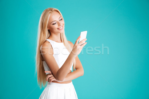 Retrato alegre nina teléfono móvil Foto stock © deandrobot