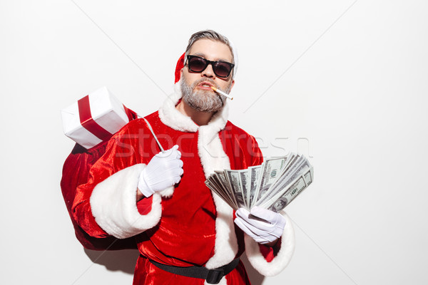 Adam noel baba hediye sigara içme Stok fotoğraf © deandrobot