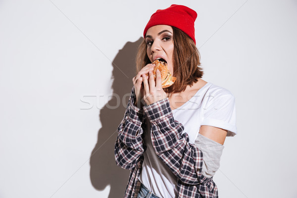 餓 年輕 女士 漢堡 圖像 襯衫 商業照片 © deandrobot