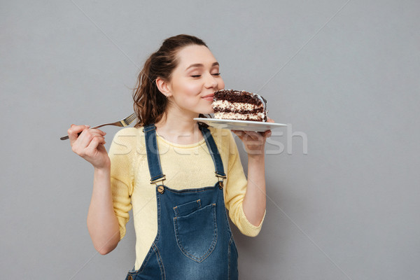 Hungry young pregnant woman going to eat chocolate cake Stock photo © deandrobot