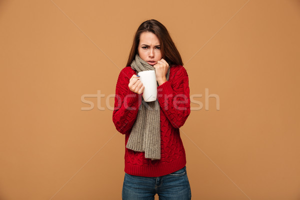 Sad sick caucasian woman drinking hot tea. Stock photo © deandrobot