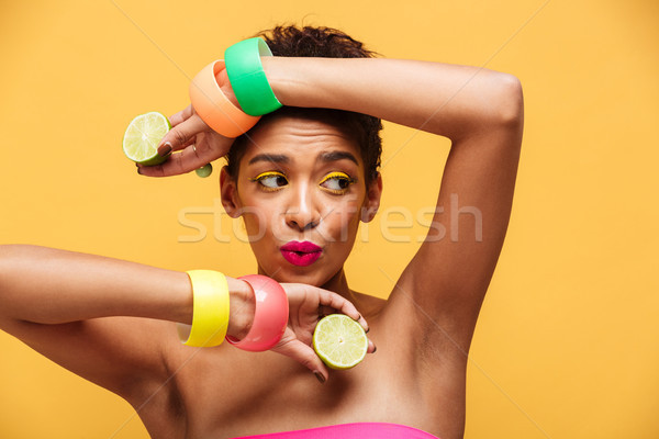 Fashion portrait of playful mulatto woman wearing trendy accesso Stock photo © deandrobot