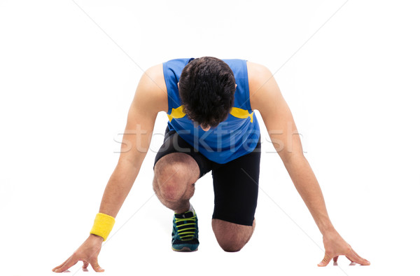 Man getting ready to run Stock photo © deandrobot