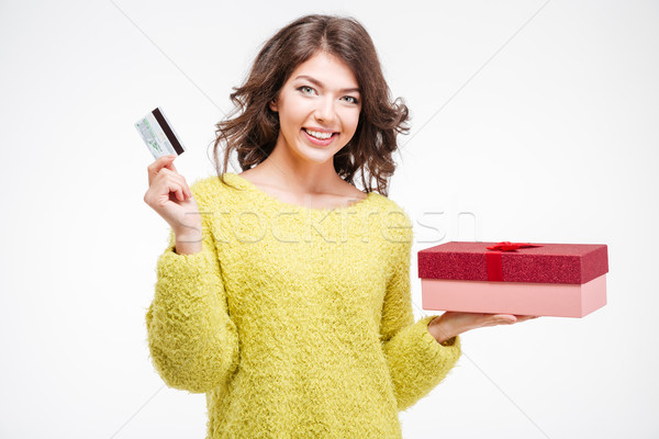 Mosolygó nő tart bankkártya ajándék doboz izolált fehér Stock fotó © deandrobot