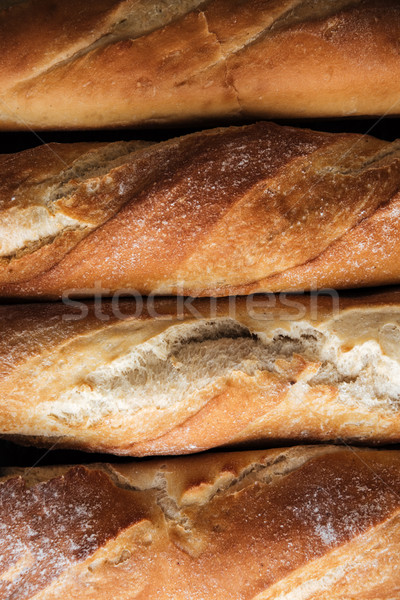 Bread loafs at bakery Stock photo © deandrobot