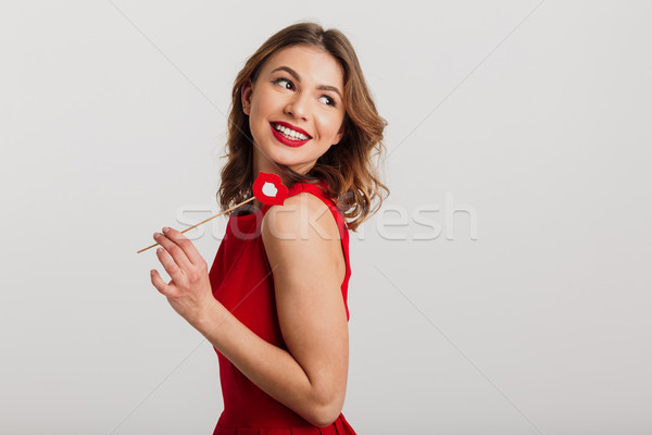 Stock fotó: Portré · gyönyörű · fiatal · nő · vörös · ruha · tart · papír