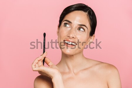 Stock photo: Cheerful lady looking camera and smiling isolated