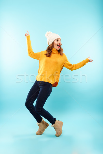 Teljes alakos portré mosolyog fiatal lány tél ruházat Stock fotó © deandrobot
