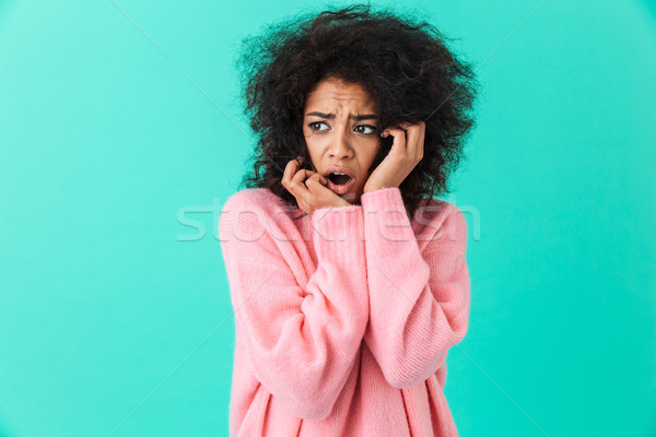 Colorful image closeup of confused woman in pink shirt looking a Stock photo © deandrobot