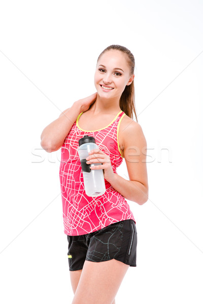 Young woman with bottle of water Stock photo © deandrobot